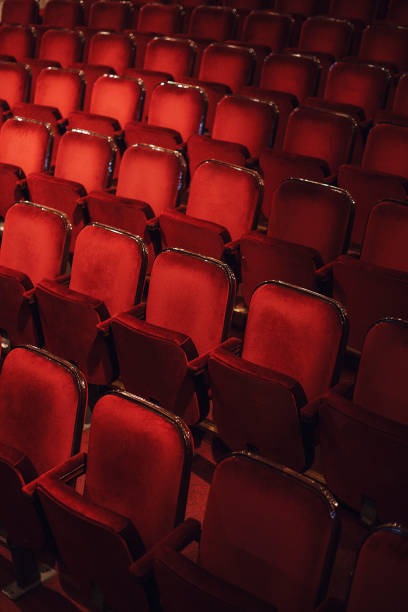 istock Empty red concert seats in a row 841257788