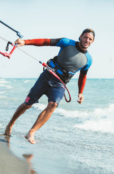 istock Portrait of handsome man kitesurfer. 841261944