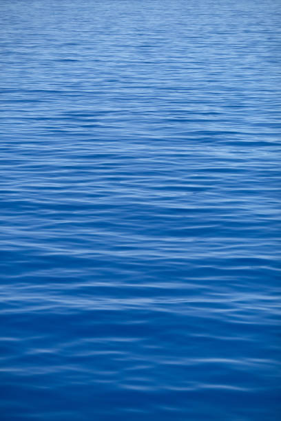 Blue calm rippled sea stock photo