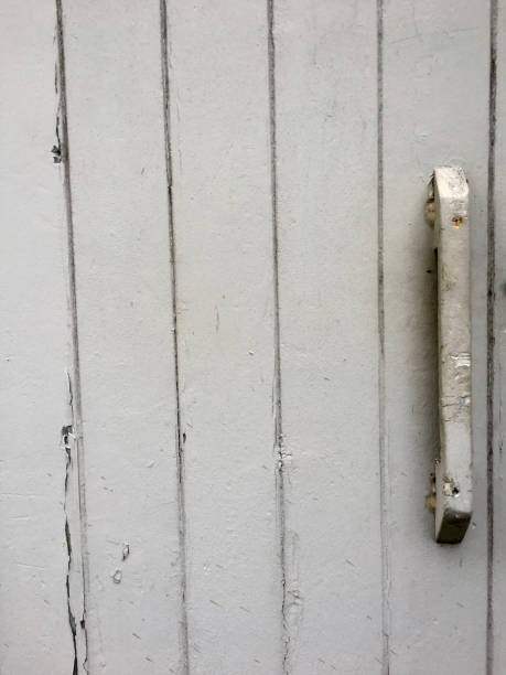 istock Old wooden door with gray paint 841265430