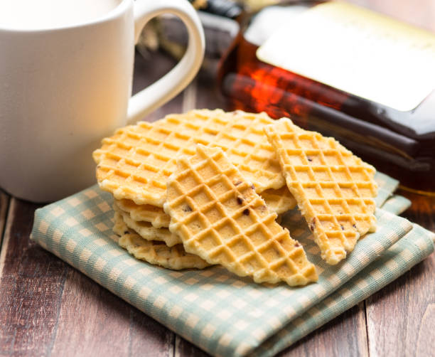 istock Crisp waffle with Cup of Milk on a wood table 841268152