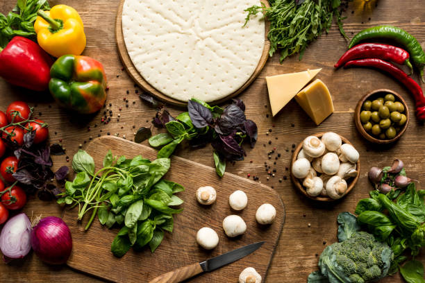 istock raw homemade pizza and ingredients 841278536