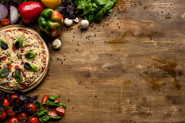 istock raw homemade pizza with ingredients 841278994
