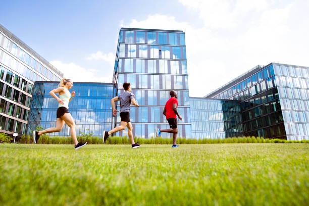 istock Young people in the city running together. 841281802