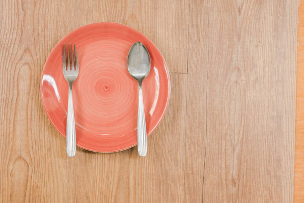 istock fork and spoon on dish 841282652