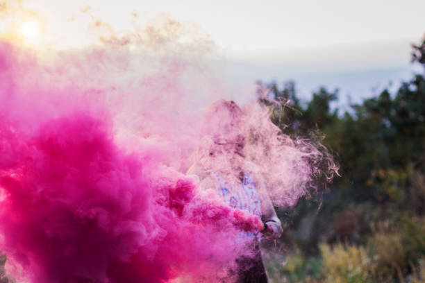 istock Girl in a red smoke cloud 841282818