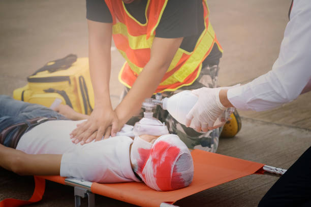 istock rescuers team for help man accidenton the road. 841283376