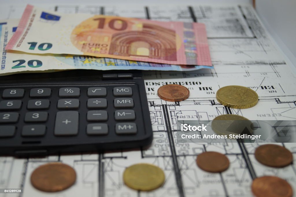 Cost of a property Construction costs, utility bills, electricity, gas, water ... how much does a property cost? Currency Stock Photo