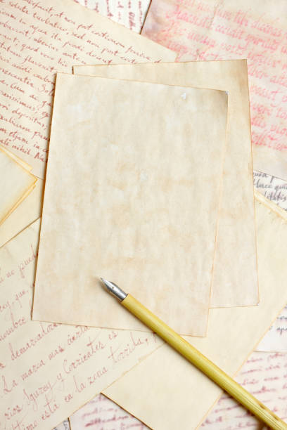 istock Aged empty paper sheets with vintage nib pen 841289778