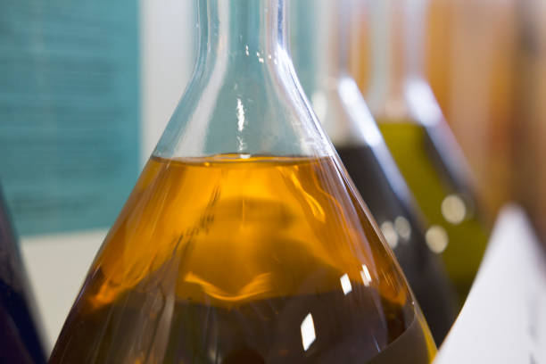istock Colored chemicals in tubes - chemistry illustration, hotizontal 841294924