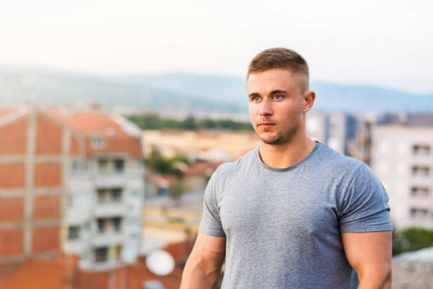 istock Confident blonde bodybuilder on the rooftop 841300866