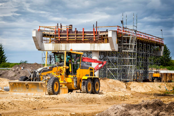 istock Yellow grader in place of future highway 841307256