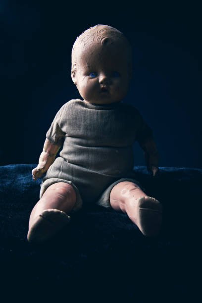 istock Creepy Old Doll In The Dark 841311550