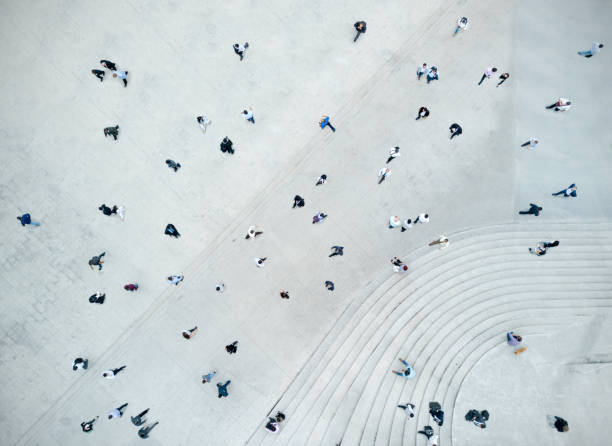 istock High Angle View Of People On Street 841319032