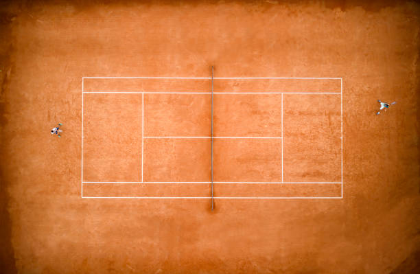 Tennis match Aerial shot of two men playing tennis tennis outfit stock pictures, royalty-free photos & images