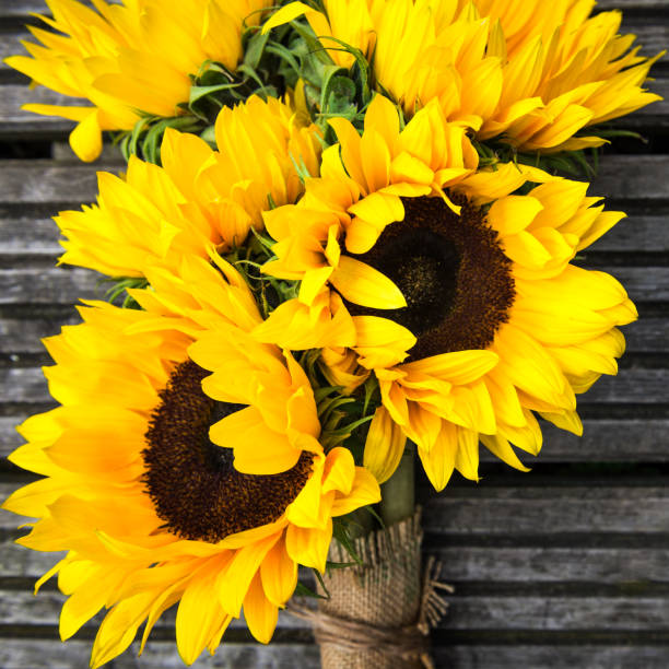istock Yellow Sunflower Bouquet on Wooden Rustic Background 841326208
