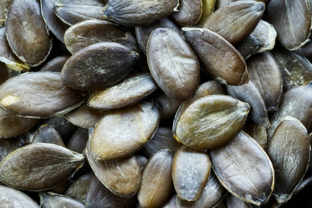 istock Close up picture of pumpkin seeds. 841333558