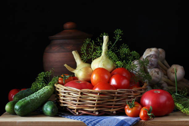 istock Vegetables and a basket on the shelf. Still life. 841336618