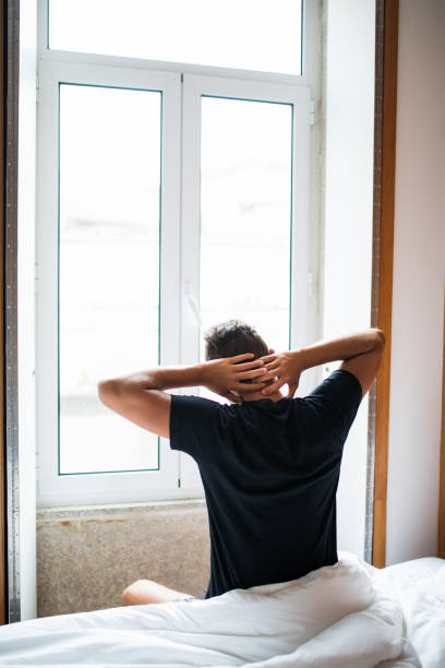 istock Man feeling back ache in the bed after sleeping in the morning 841364714