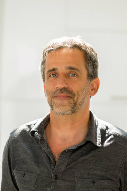 istock portrait of handsome middle aged man 841364928