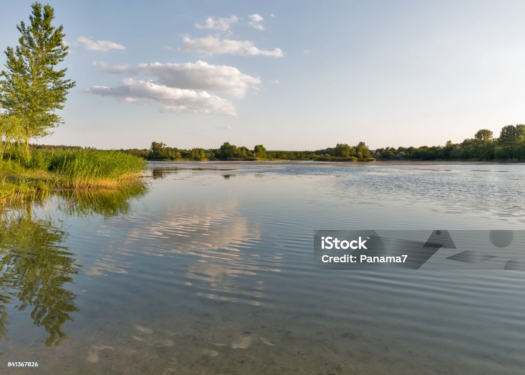 Ballast lake sunset landscape in Voznesensk, Ukraine. Ballast lake sunset summer landscape in Voznesensk, Ukraine. Backgrounds Stock Photo