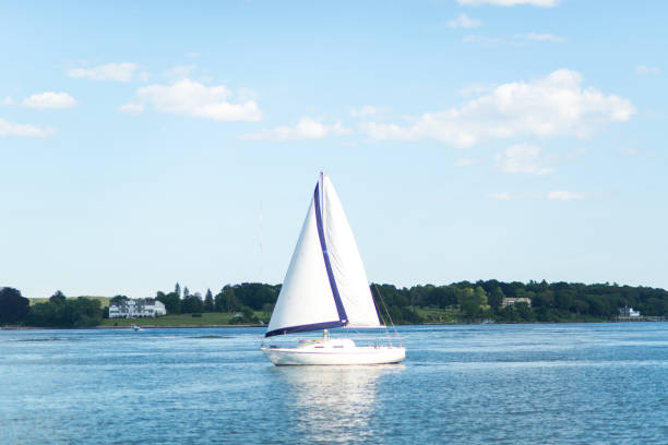 istock Yatch and blue sea with a city background 841368132