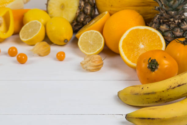 istock Pile of orange and yellow fruit 841368618