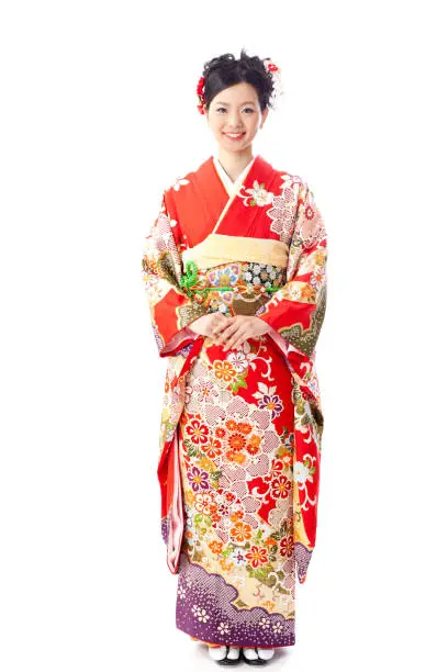 asian woman wearing traditional kimono named furisde isolated on white background