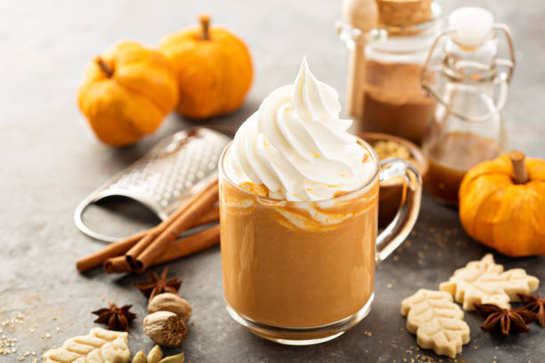 istock Pumpkin spice latte in a glass mug 841371570