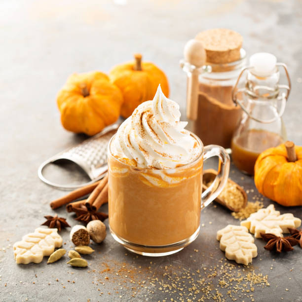 istock Pumpkin spice latte in a glass mug 841371946
