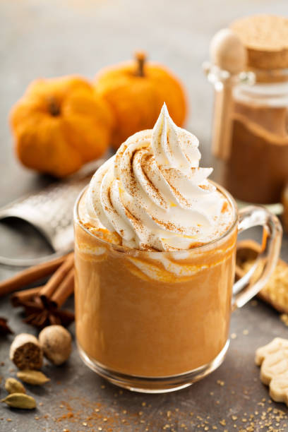istock Pumpkin spice latte in a glass mug 841372356