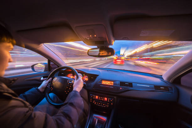 istock Night city road view from inside car 841379434