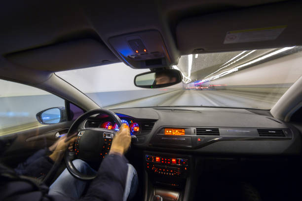 istock Night city road view from inside car 841379498