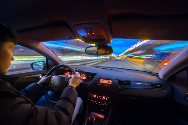 istock Night city road view from inside car 841379664
