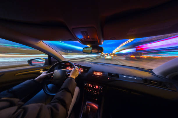 istock Night city road view from inside car 841379704