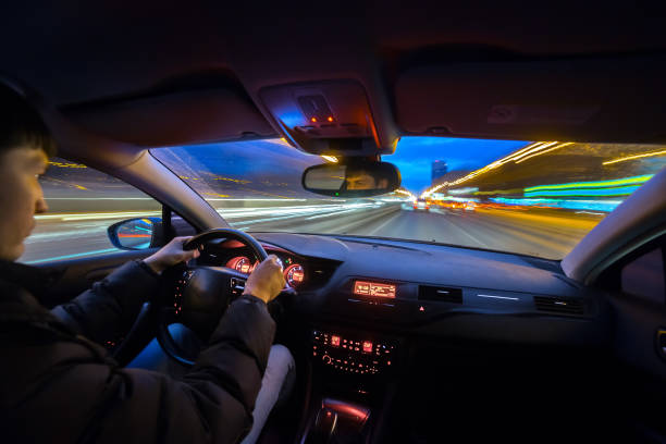 istock Night city road view from inside car 841379756