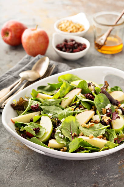 istock Fall salad with spring mix, apple and cranberry 841379758