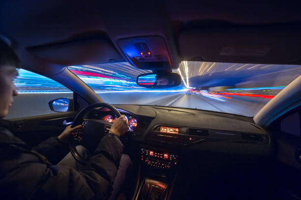istock Night city road view from inside car 841379986