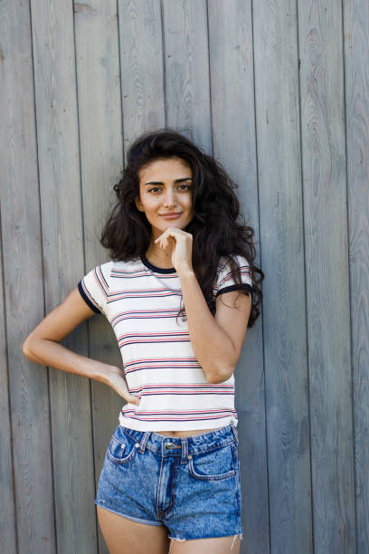 istock Portrait of a beautiful young brunette, looking at camera 841380740