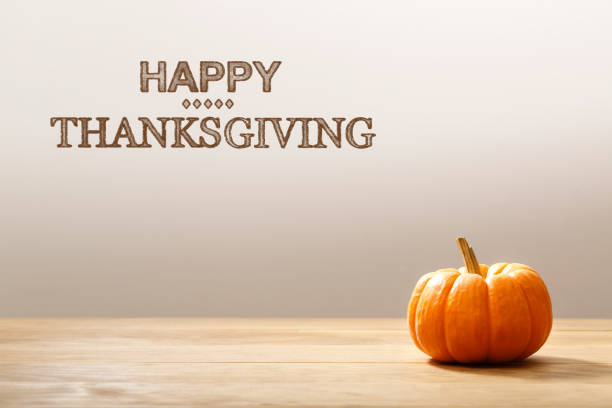 istock Thanksgiving message with orange pumpkin 841383504