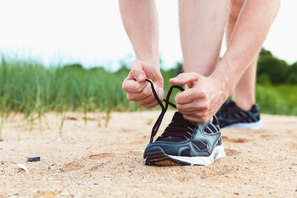 istock Runner preparing for a jog outdoors 841386312