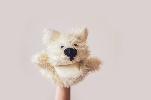 istock Puppet show dog on a gray background. Space for text or replicas 841386814