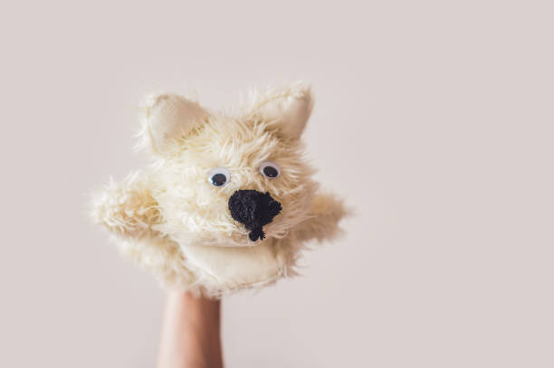 istock Puppet show dog on a gray background. Space for text or replicas 841386848