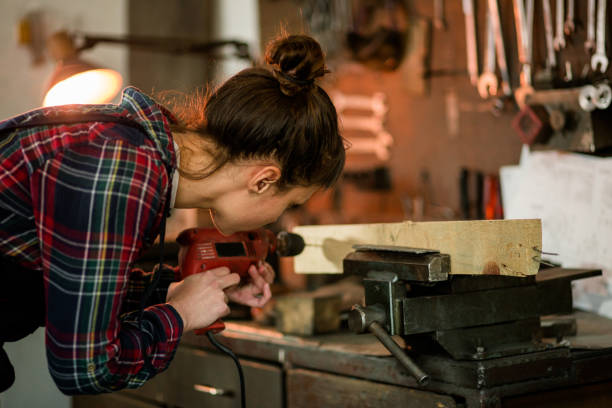 istock Female Carpenter At Place Of Work 841396374