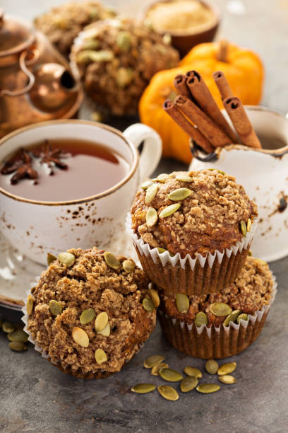 istock Healthy pumpkin muffins with tea and spices 841396426