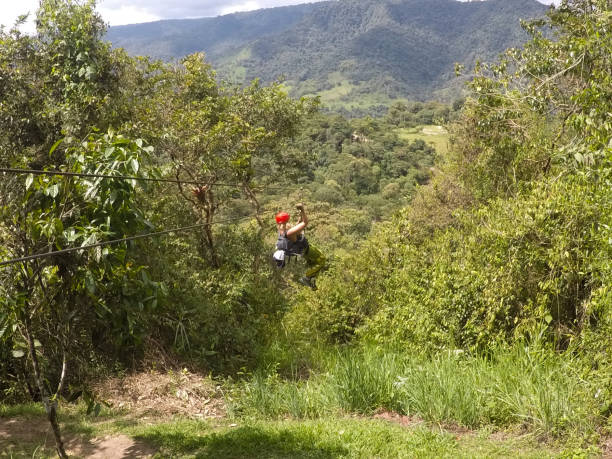 istock Woman zip lining in Ecuador 841397402