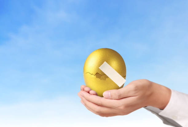 istock Holding Of Golden Eggs 841403846