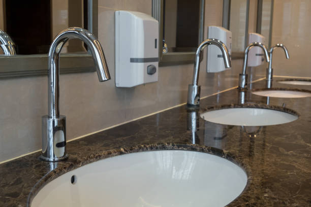 istock Chrome faucet with washbasin in modern bathroom 841405358