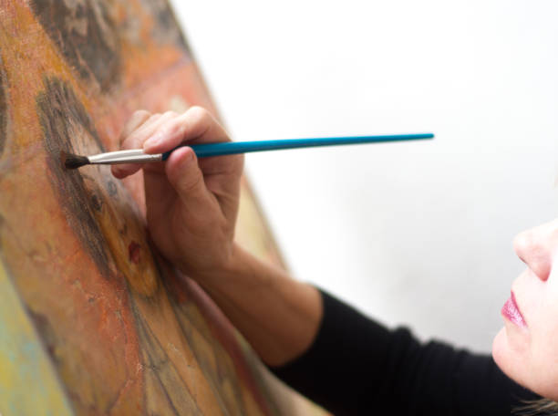 istock Female Artist Painting (Close-Up) 841409310