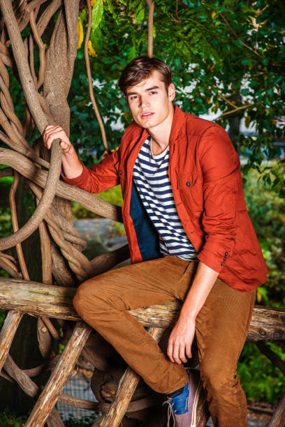 istock Young Man Relaxing at Central Park, New York 841412282